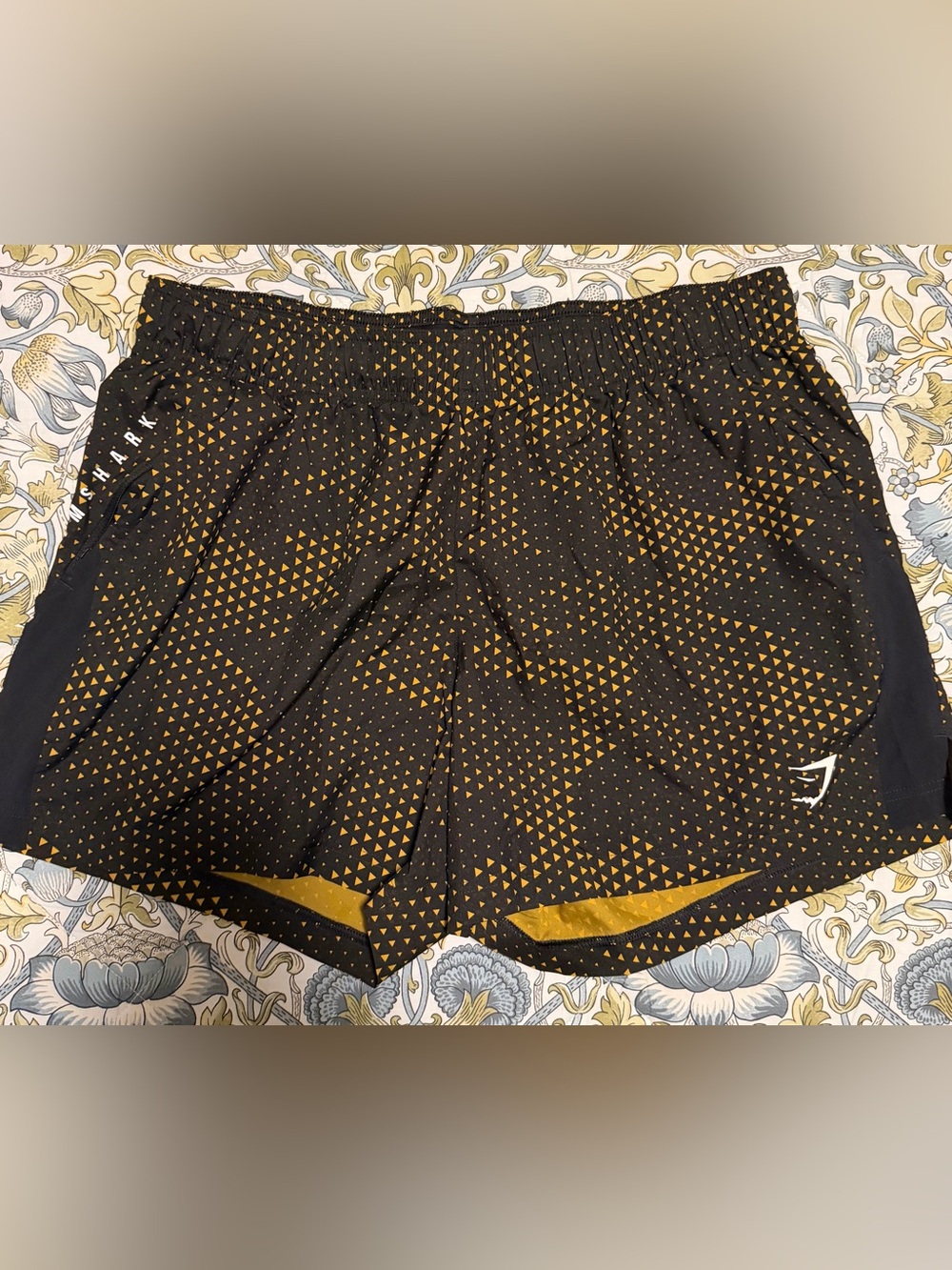 Gymshark 5” Black Athletic Shorts with Gold Triangle Print